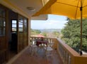 Shaded deck upstairs overlooks Ko Khaam Yai and the mainland