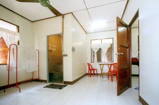 Sitting room, not showing fridge and cupboards.